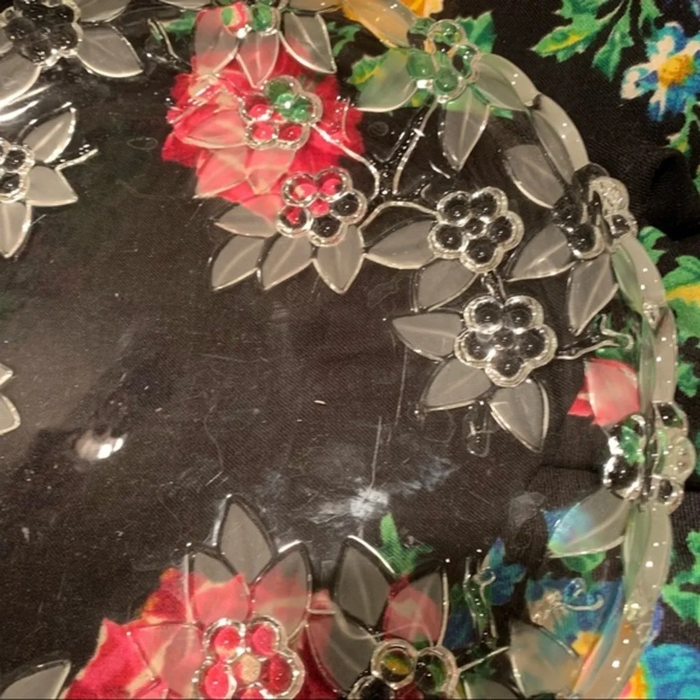 Antique serving platter. Beautifully done. Etching. Embossing. 12”